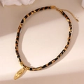 Leopard print velvet cord necklace with gold palm tree oval pendant and lobster clasp - Palm Tree