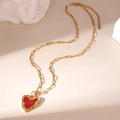 Detail of red heart pendant with irregular gold frame on a vintage paperclip chain - Red Heart