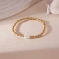 18K gold plated copper bead bracelet featuring a central white mother-of-pearl flower - Gold Flower