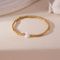 18K gold-plated beaded bracelet with white heart shell charm and elastic design - Gold Heart