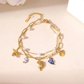 18K gold plated stainless steel layered bracelet with ocean charms and pearls - Blue Fish