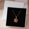Rotating zircon flower necklace in a jewelry gift box with gold plated O-chain - Red