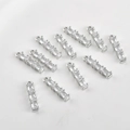 Close-up of 14k gold-plated bamboo pendants with cubic zirconia for DIY jewelry - 白k底白色锆石款