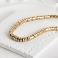 Macro shot of 4mm gold-plated volcanic stone wheel beads with hammered texture - Style 5 KC Gold Disc 7mm (Approx 6.7x2.3mm Hole 1mm)