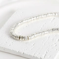 Detailed close-up of 4mm silver lava wheel spacer beads on white stone background - Style 6 Silver Disc 7mm (Approx 6.7x2.3mm Hole 1mm)