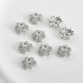 Macro view of silver star-shaped filigree bead caps with intricate hollow-out metal details - White Gold Plated Star Bead Cap (Approx 11.5mm Hole 2.2mm)
