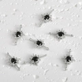 Detail of 14k gold-plated starburst charms with black stones and zircon for DIY jewelry - Silver-Black