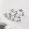 Macro view of 14k gold-plated lace hollow spacer beads for DIY jewelry making - 22#a Style White (5 Pieces) (approx. 5 X 4.2mm Holes Approx. 1mm)
