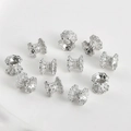 Detailed view of silver lace hollow spacer beads for DIY jewelry making and necklace crafts - Style D Trumpet Hollow (28#) / White Gold