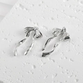Dettaglio fronte e retro di ciondoli a fiocco in argento lucido per creazione di gioielli - Argento