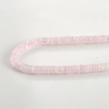 Close-up of pink translucent natural stone flat beads for DIY jewelry making - 24# Abacus Bead Style / 2x6mm (160 Pieces/Pack) / Rose Quartz