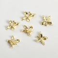 Close-up of 14k gold-plated flower charms with zirconia center for DIY jewelry making - 14K Gold Double Hanging Flower