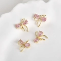 Close-up of pink zircon bow pendants with 14k gold plating for DIY jewelry making - 7# Pink Zirconia Double Layer Bow 14K