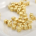 Close-up of 14k gold-plated square beads with hammered texture for DIY jewelry making - 18K Gold Color (Approx 5.1*4.7mm)
