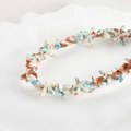 Macro detail of vintage oil painting style starfish beads with mottled turquoise glaze - Red Blue Starfish