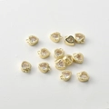 Close-up of 14k gold plated heart pendant with sparkling cubic zirconia inlay - White Zirconia