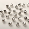 Macro detail of irregular silver-plated spacer beads with glossy metallic texture - Silver Color Square Spacer Bead (Approx 6.5*6mm Hole 0.5mm)