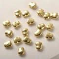 Irregular 14k gold plated spacer beads for DIY jewelry making on white textured surface - 14K Gold