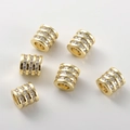 Dettaglio di perle a barilotto in rame placcato oro 14k con zirconi per gioielli fai-da-te - Stile C Perla a Botte Oro (Circa 6.5x6.5mm Foro 3.4mm)