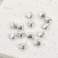 Détails macro de breloques en coquillage argenté pour la création de bijoux DIY raffinés - Coquillage Argenté (9.7*8.8mm)