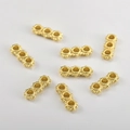 Detail of 18k gold plated 3-hole snowflake spacer beads for DIY jewelry making - 12.8x4.9mm / 18K Gold