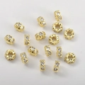 Macro view of 14k gold-plated heart-shaped spacer beads with cubic zirconia for DIY jewelry - Heart Style / 14K Gold