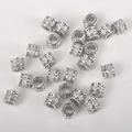 Detailansicht vergoldeter Zylinder-Zwischenperlen mit funkelnder Zirkon-Einlage für DIY - Weiß K Mehrloch Zirkonia Spacer Perle (5.4*6.8mm)