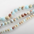 Macro shot of assorted natural gemstone round beads in various sizes for DIY jewelry making - 8# Shoushan Stone / 6mm