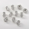 Macro detail of 14k gold plated flower spacer beads with sparkling zircon stones - Flower Style / White Gold