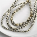 Macro shot of assorted size Dalmatian Jasper round beads for DIY jewelry making - 1# Dalmatian Jasper / 4mm