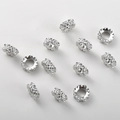 Macro view of four-leaf clover rondelle beads with micro-pave cubic zirconia crystals - White K Large Flower Spacer Bead (14#)