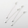 Dettaglio di quattro catene di estensione argentate con chiusure a moschettone e cuori - Argento Cuore con Singolo Zircone