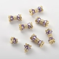 Macro detail of 14k gold plated bow clasp with purple zircon and screw connector for DIY jewelry - 14k Gold Plated Purple Zirconia Style
