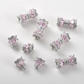 Detail of pink zircon bow connectors and silver screw clasps for DIY jewelry making - Silver Plated Pink Zirconia Style