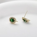 Macro detail of emerald oval stud earring component with golden halo and hanging loop - #1 14k Emerald Earring Post [1 Piece] (approx. 13.8*8.8mm)