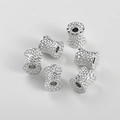 Macro detail of silver hammered metal beads with a textured finish for jewelry making - Silver Tone Large (10.4x10.4mm)