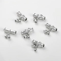 Detailed view of silver bamboo-style curved tube charms with lily bell pendants for DIY - White K Lily Of The Valley Curved Tube