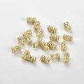 Macro shot of 14k gold plated wheel spacer beads with micro-set cubic zirconia stones - Small Barrel Bead (6.2*3.8mm) / 0.9mm Hole / 14K Gold