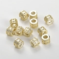 Macro detail of 14k gold plated hexagonal wheel spacer beads with double row cubic zirconia - Large Hole Barrel Bead (7.9*6.5mm) / 4mm Hole / 14K Gold