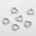 Detailed view of six heart-shaped bamboo style silver pendants with cubic zirconia - 14# White Gold Bamboo Joint Heart (Approx 14.8*13.8mm)