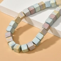 Macro shot of multi-colored natural stone square beads for DIY jewelry making - Big Square Style / Multicolor