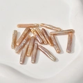 Macro detail of natural champagne baroque stick pearls with metallic luster for DIY jewelry - Pearl Pink