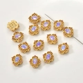 Macro detail of retro gold-plated beads with iris gemstones and red rhinestones - Aurora Ruyi Spacer (5#)