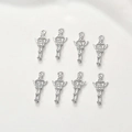 Macro shot of 14k gold-plated fairy magic wand charms with zirconia for DIY jewelry - Silver Magic Wand
