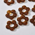 Macro shot of amber translucent five-petal flower resin beads for DIY jewelry making - Flower Style (17#) / 1 Piece / Caramel color