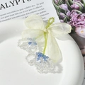 Detail of sweet chiffon bow with crystal flower beads on elegant ceramic tray - White Blue Chiffon Bow Flower