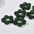 Macro shot of dark green transparent glass flower beads with center holes for jewelry DIY - Flower Style (16#) / 1 Piece / Dark Green