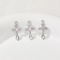 Macro detail of silver cross pendant with pink zircon and intricate embossed texture - Silver Pink Zirconia Style (4# White K Pink Zircon Cross)
