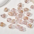 Makroaufnahme von 15 mm rosa Herzglasperlen mit buntem Glitzer für DIY-Schmuckherstellung - 1 Stück / Rosa