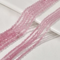 Dettaglio di perline sfaccettate in cristallo rosa occhio di gatto per gioielli DIY - 2mm / Rosa